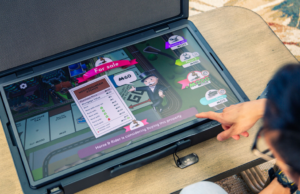 Este sistema de entretenimiento portátil es parte del maletín, la consola de juegos en parte