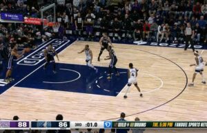 Nickeil Alexander-Walker con la última canasta del período