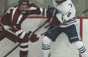 Div. I Hockey Race calentando