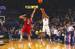 Michigan coincide con MSU con su propio timbre-beating 3 para mantener el ritmo en Big Ten Race