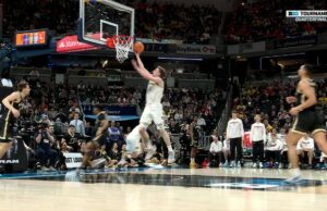 Tre Donaldson obtiene el robo y encuentra a Danny Wolf para el final, extendiendo el liderazgo de Michigan contra Purdue