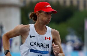 Dunfee de Canadá rompe 35 km de carreras récord mundial