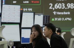 Las acciones asiáticas avanzan después de que Wall St se recupere a su mejor día en meses, y China informa datos sólidos