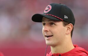 John Lynch confía en hacer un trato con Brock Purdy